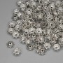 Čepičky na korálky, barva kovu stříbrná, průměr 6×1 mm, otvor 1,4 mm, balení 20 g (~146 ks)