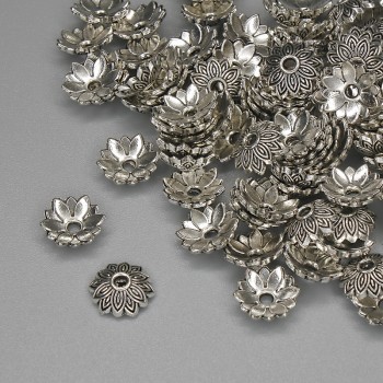 Korálkové čepičky na korálek, barva kovu stříbrná, průměr 7,5×1 mm ± otvor 1,5 mm ± balení 20 g (cca 89 ks)