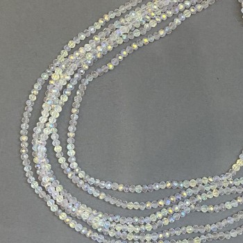 Korálky z českého křišťálu na vlascu bílé průhledné s benzínovým nástřikem, brusované rondely, průměr 3,5×3 mm, délka 33 cm