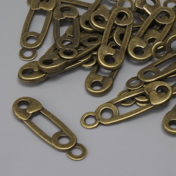 Přívěšek „Špička“ bronzové barvy, průměr 23×7 mm, otvor pro ucho 2,2 mm, balení 22 ks