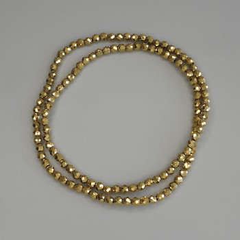 Korálky hematitu zlaté barvy, broušené kuličky 3 mm ±, navlečené na vlascu, délka 38 cm