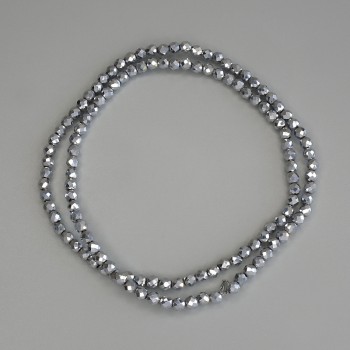 Hematitové korálky ve stříbrné barvě, granované kuličky 3 mm ±, navlečené na vlascové šňůře, délka 38 cm ±