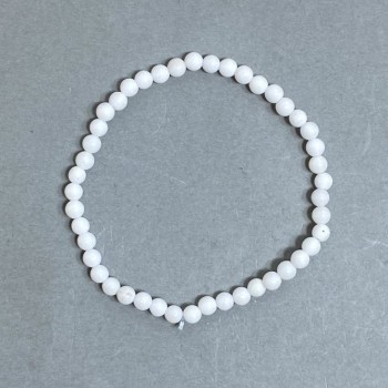 Náramek z achátu, korálky o průměru cca 4 mm, délka cca 18 mm, elastický