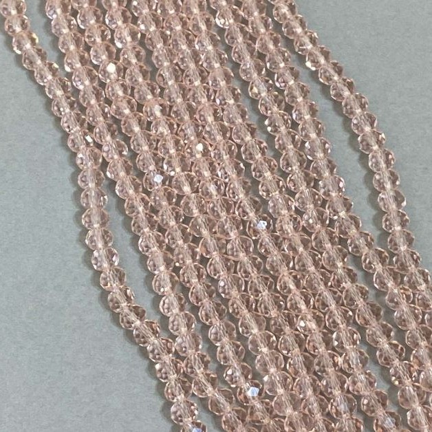 Korálky z Českého křišťálu, růžové, průhledné, na niti broušené rondely, průměr 6×5 mm +-, délka 42 cm +