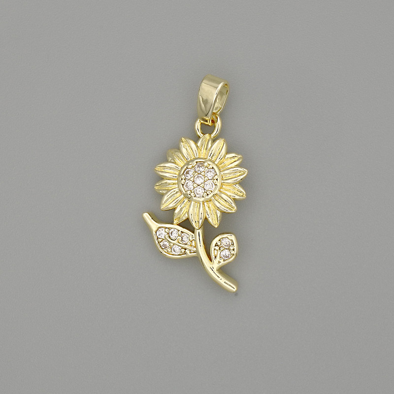 Přívěšek Slunečnice zlatistý kov s bílými štrasovými kamínky, rozměry 26×12 mm