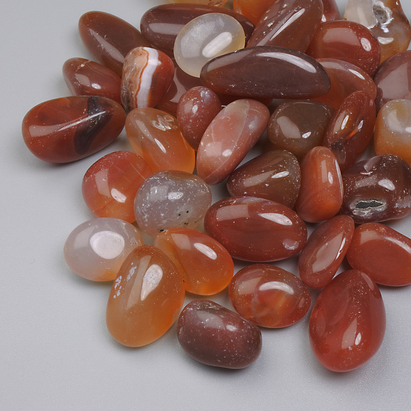 Přírodní karneol fasetovaný bez díry 12–28×10–14 mm ± (za 100 g ±)