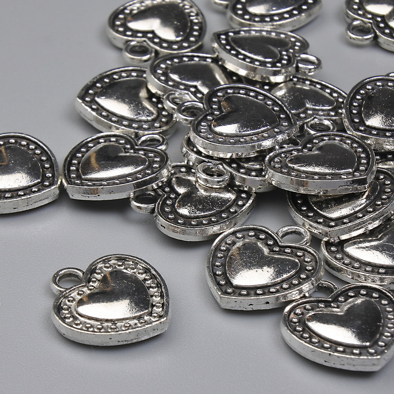 Přívěšek srdce, barva kovu stříbrná, průměr 13×11,5 mm, 5 mm ± balení 20 g (~21 ks)