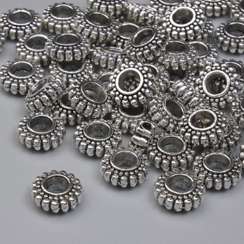 Kovové komponenty pro šperky – korálková vložka, barva kovu: stříbrná, průměr 7×3 mm ± otvor 2,8 mm ±, balení 20 g (~41 ks)