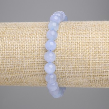 Náramek z akvamarínu, hladké korálky o průměru 8 mm, délka cca 18 cm, na elastické šňůrce