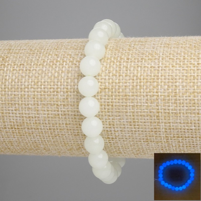 Náramek z modrého onyxu (modře svítící) hladké korálky, průměr cca 8 mm, délka cca 18 cm, na gumičce