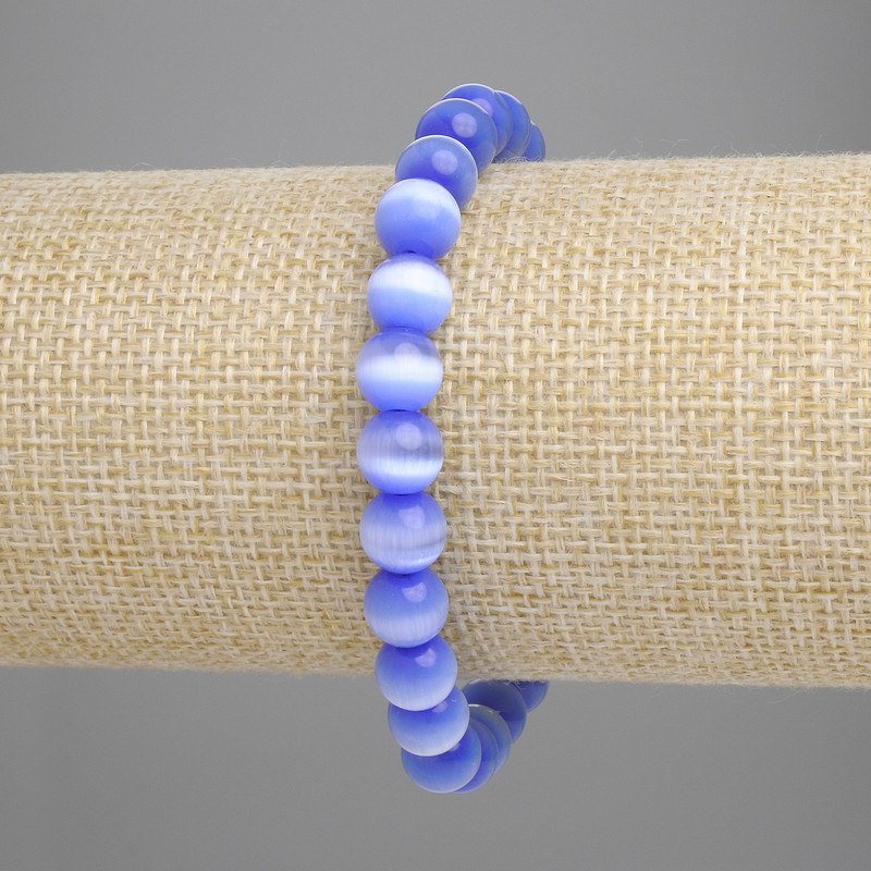Náramek z modrého kočičího oka (syntetické) – hladké kuličky, průměr 8 mm ±, délka 18 cm ± elastická šňůrka