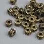 Bronzová korálková vložka – barva kovu bronz, průměr 5,5×4 mm ± otvor, průměr 3 mm ± balení ~32 ks
