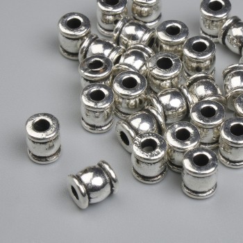 Korálka-vložka kovová, barva kovu stříbrná, rozměr 6×5 mm ± otvor, průměr díry cca 2,4 mm ± balení cca 28 ks
