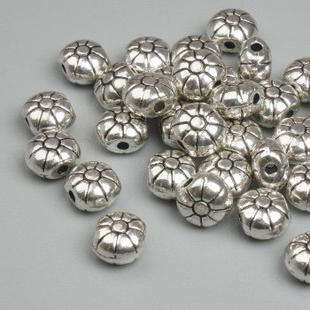 Kovové součásti - korálka-vložka, barva kovu stříbrná, průměr 5,5 mm ±, otvor 1,3 mm ±, balení 20 g ~32 ks.
