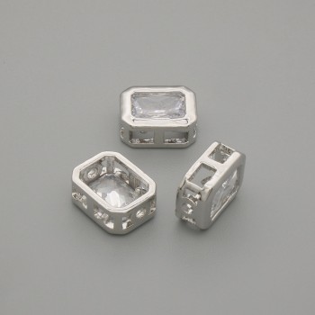 Bižuterní díl – korálková vložka s bílým krystalem, barva kovu stříbrná, průměr 9×7 mm ±, otvor průměr cca 1,3 mm ±, za 1 ks +