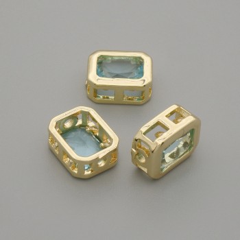 Bižuterní korálka-vložka s modrým krystalem, zlatá barva kovu, průměr 9×7 mm ±, otvor průměru cca 1,3 mm ±, za 1 ks +