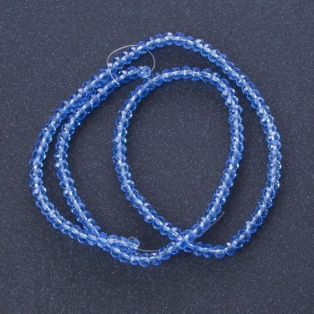 Korálky Český křišťál, průhledná světle modrá barva, délka 37 cm, průměr 3–4 mm