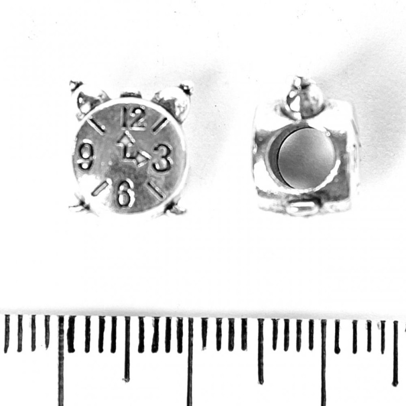 Korálek Pandora Hodinky 9×11 mm, díra 5 mm, fas. 20 g ± 9 ks