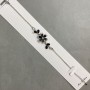 Náramek Černá květina s bílými štrasovými kamínky, průměr 19 mm, délka 16–19 cm+