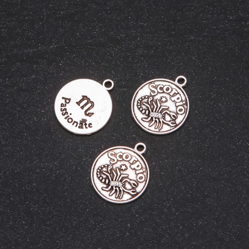 Kovové závěsné komponenty Zodiak Škorpion, průměr 17 mm, balení 20 g ± 10 ks