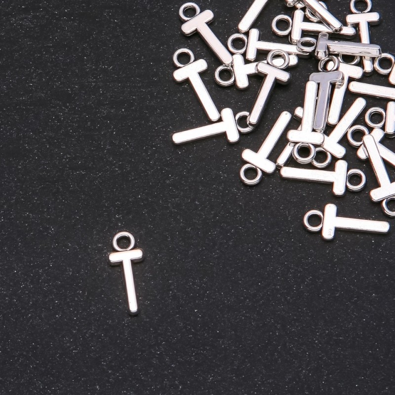 Přívěšek s písmenem 'T' 17×7 mm, balení 20 g (+/- 30 ks)