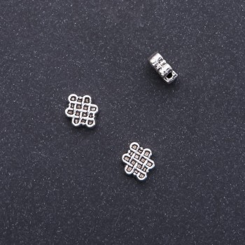 Rozdělovací korálka s filigránem, průměr 9×11 mm, vnitřní průměr 1,75 mm, balení 20 g, 17 ks (+ -)