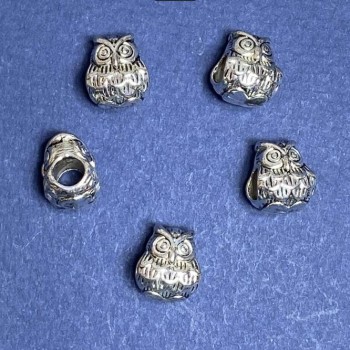 Kovová korálka-vložka, rozměr 11×9 mm, vnitřní otvor 4,5 mm, balení 20 g ±9 ks