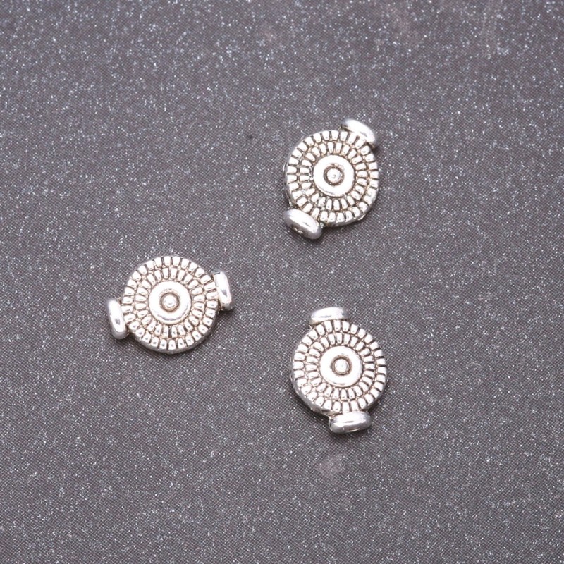 Šperkové komponenty – korálková vložka, rozměr 7×10 mm, vnitřní průměr 0,8 mm, balení 20 g ± 37 ks