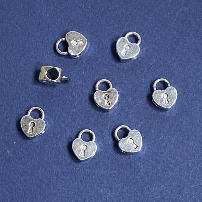 Vložená korálka pro šperky, rozměr 10×13 mm, vnitřní průměr 4 mm, balení 12 ks, hmotnost balení cca 20 g