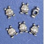 Kovová korálka Žába 10 × 14 mm, průměr díry 5 mm, balení 20 g ± 8 ks