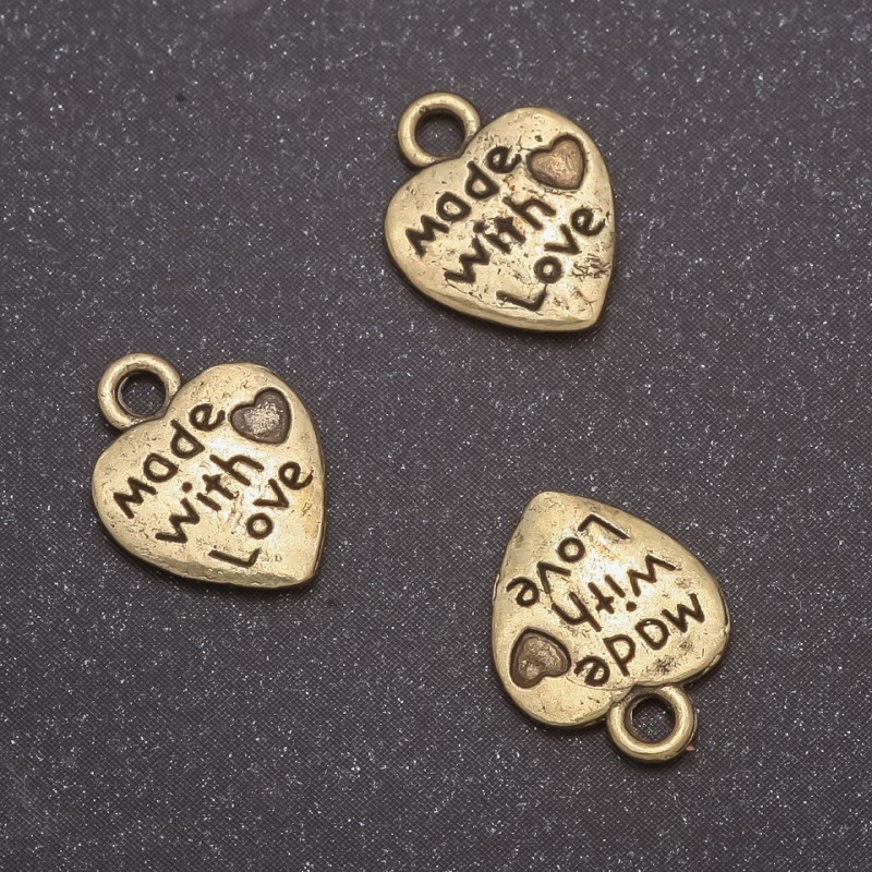Příslušenství – přívěšek srdce, průměr 13×10 mm, otvor 1,5 mm, balení 20 g ± 44 ks