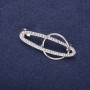 Brož Akcent Orbita bílé štrasové kamínky 43×20 mm, stříbrný kov