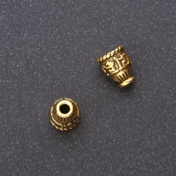 Koncovka čepička na korálky 9×7×4 mm, vnitřní průměr 2,5–4 mm, balení 20 g (24+ ks). Barva: staré zlato
