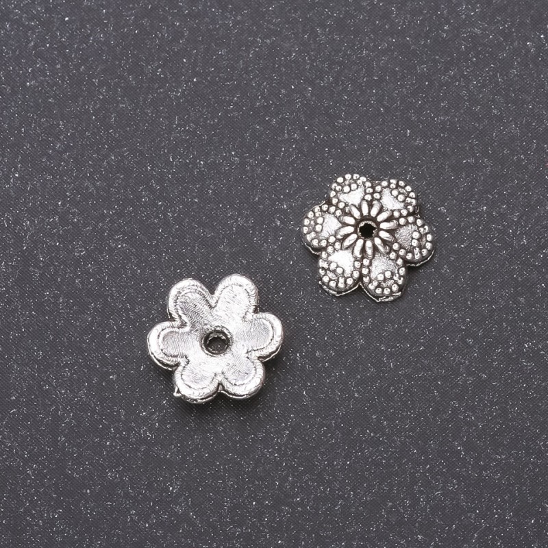 Koncovka kaplička na korálky 9 mm, vnitřní průměr 1,8 mm, balení 20 g (přibližně 48 ks). Barva: stříbrný kov
