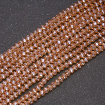 Korálky Český křišťál průhledné šampaň s benzínovým nástřikem, tvaru rondele, průměr 3,5×3 mm, délka niti 38 cm