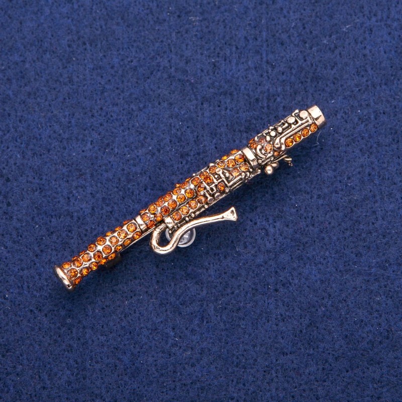 Brož Fagot se žlutými štrasami 12 × 62 mm, zlatý kov