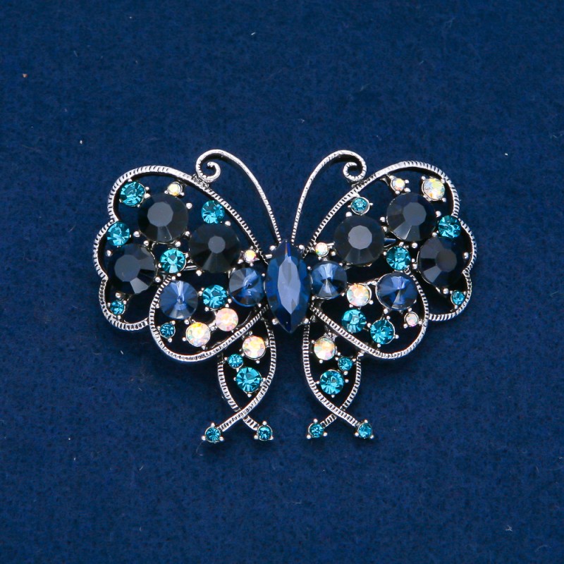 Brož Motýl ze stříbrného kovu, modré, bílé a benzínové krystaly 61×48 mm