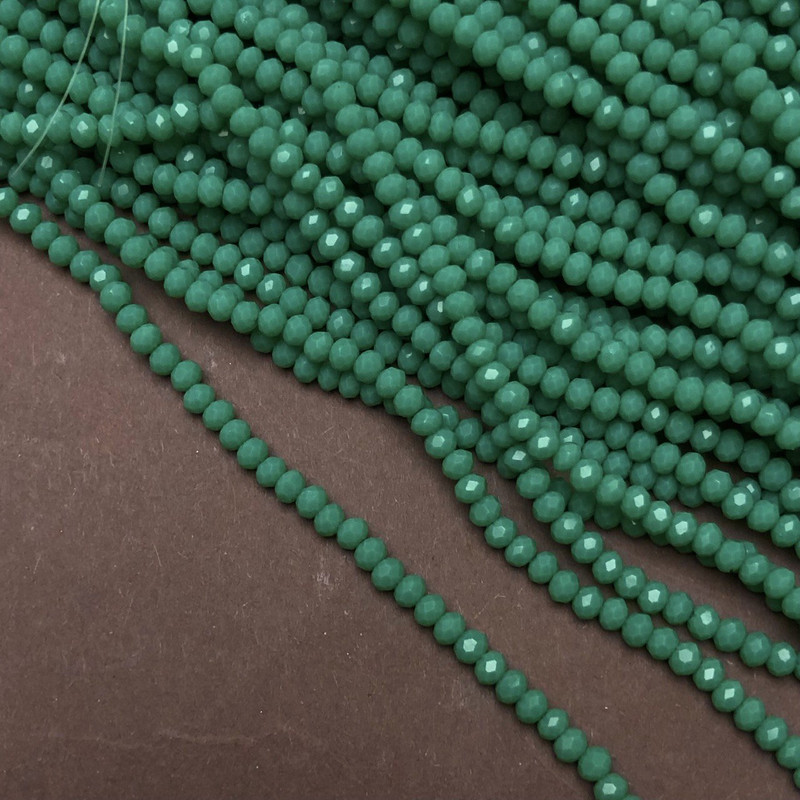 Korálky českého křišťálu na vlasové šňůře, světle zelené matné brusované rondely, průměr 3×2,5 mm, délka 36–38 cm