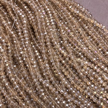 Korálky českého křišťálu na niti, šampaň průhledné s benzínovým odleskem, brusovaný rondel, průměr 3,5×3 mm, délka 36–38 cm