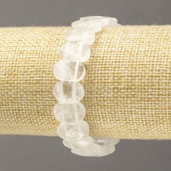 Náramek na gumičce z přírodního kamene — horský křišťál, fazetovaný článek, průměr cca 14 × 9,5 mm