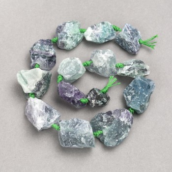 Korálky fluoritu, nerafinované, navlékané na niti, průměr 20×25 mm, délka 42 cm
