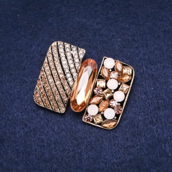 Brožka Akcent Řád krásy se žlutými štrasovými kameny, zlatavý kov, 34×45 mm