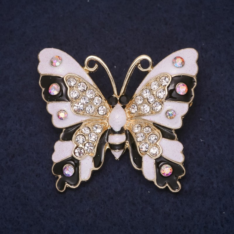 Brož Motýl 43×38 mm, krystaly, smalt, barva bílo-černá, chameleon, zlatavý kov