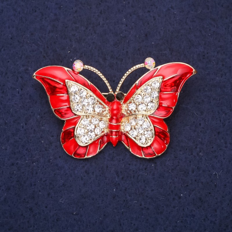 Brož Motýl, červený smalt, bílé štrasové kamínky, 45×28 mm, žlutý kov