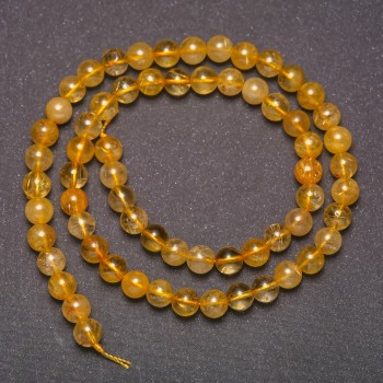 Korálky z přírodního kamene rutilitový křemen – hladká kulička, průměr 6 mm (±), délka 38 cm