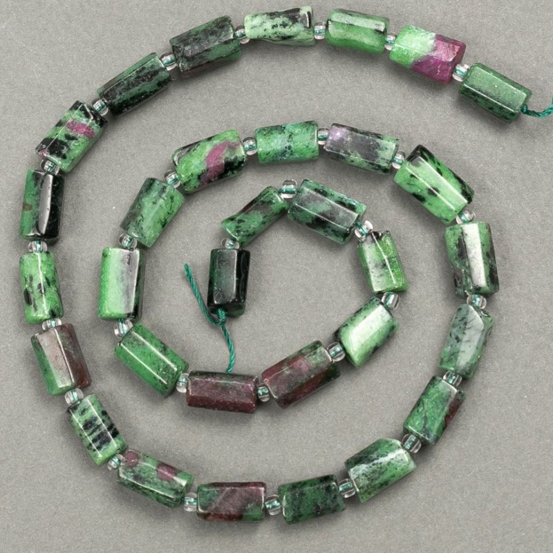 Korálky zoizitu brusované na niti, 11×7 mm, délka cca 40 cm, s rokajlem (3×2 mm)