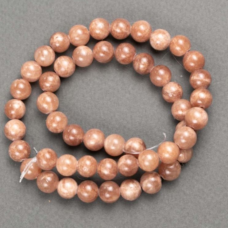 Korálky ze selenitu (umělý akryl) na šňůrce, hladká kulička, průměr 8 mm, délka 40 cm