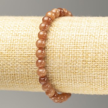 Náramek na gumičce z imitace selenitu, hladká korálka, průměr 6,5 mm, délka 18 cm