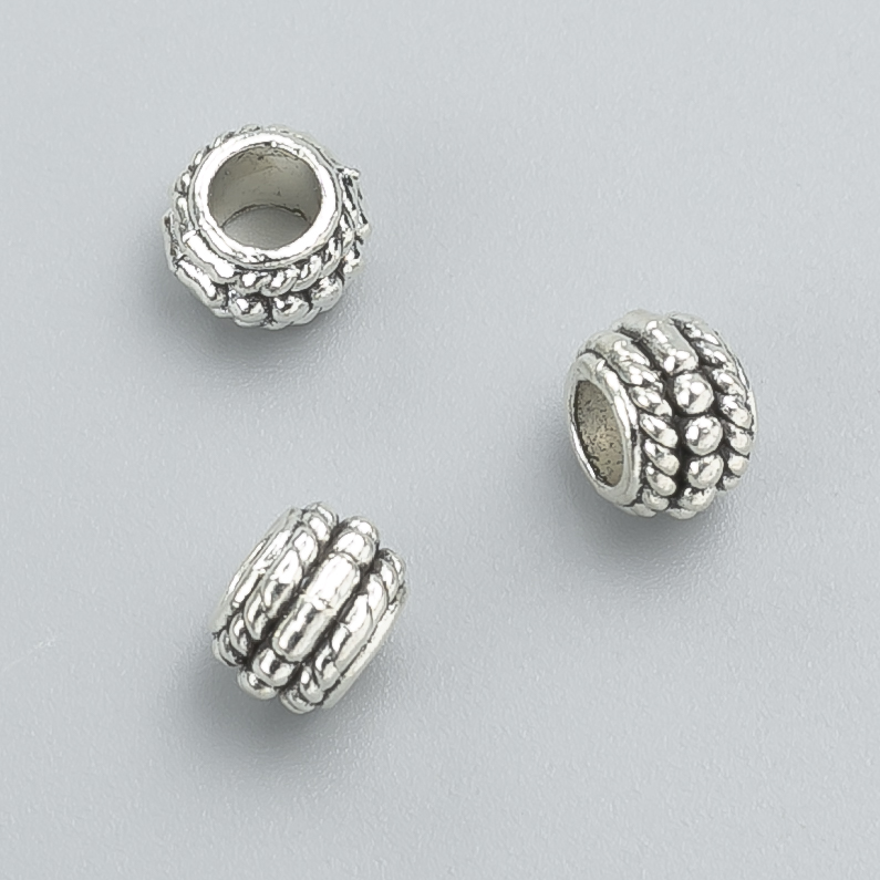 Korálka-vložka, průměr 8×6 mm, balení 20 g, 26 ks ±, barva kovu: stříbrná