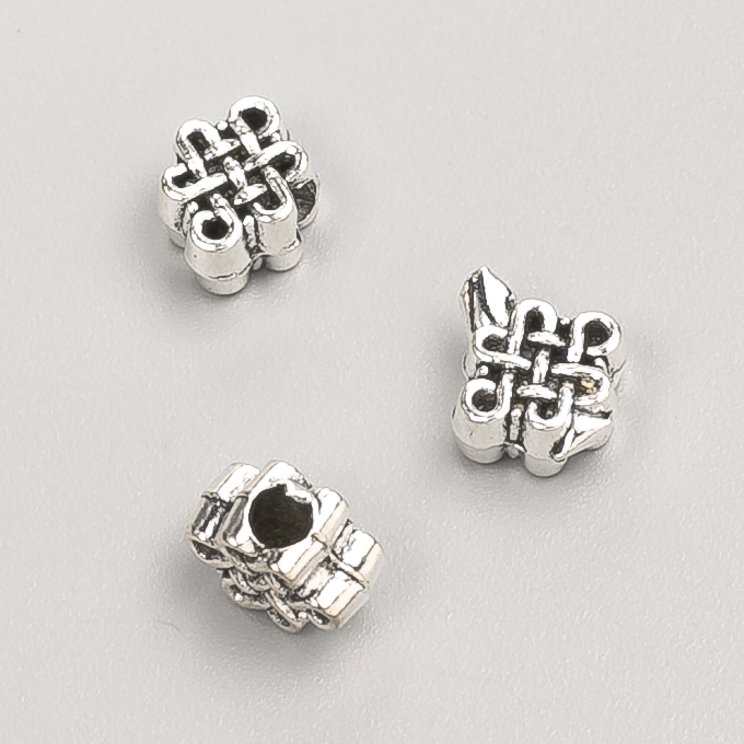 Kovový díl - korálka vložka, průměr 8×7×5 mm, balení 20 g, 30 ks ±, barva kovu "stříbro"